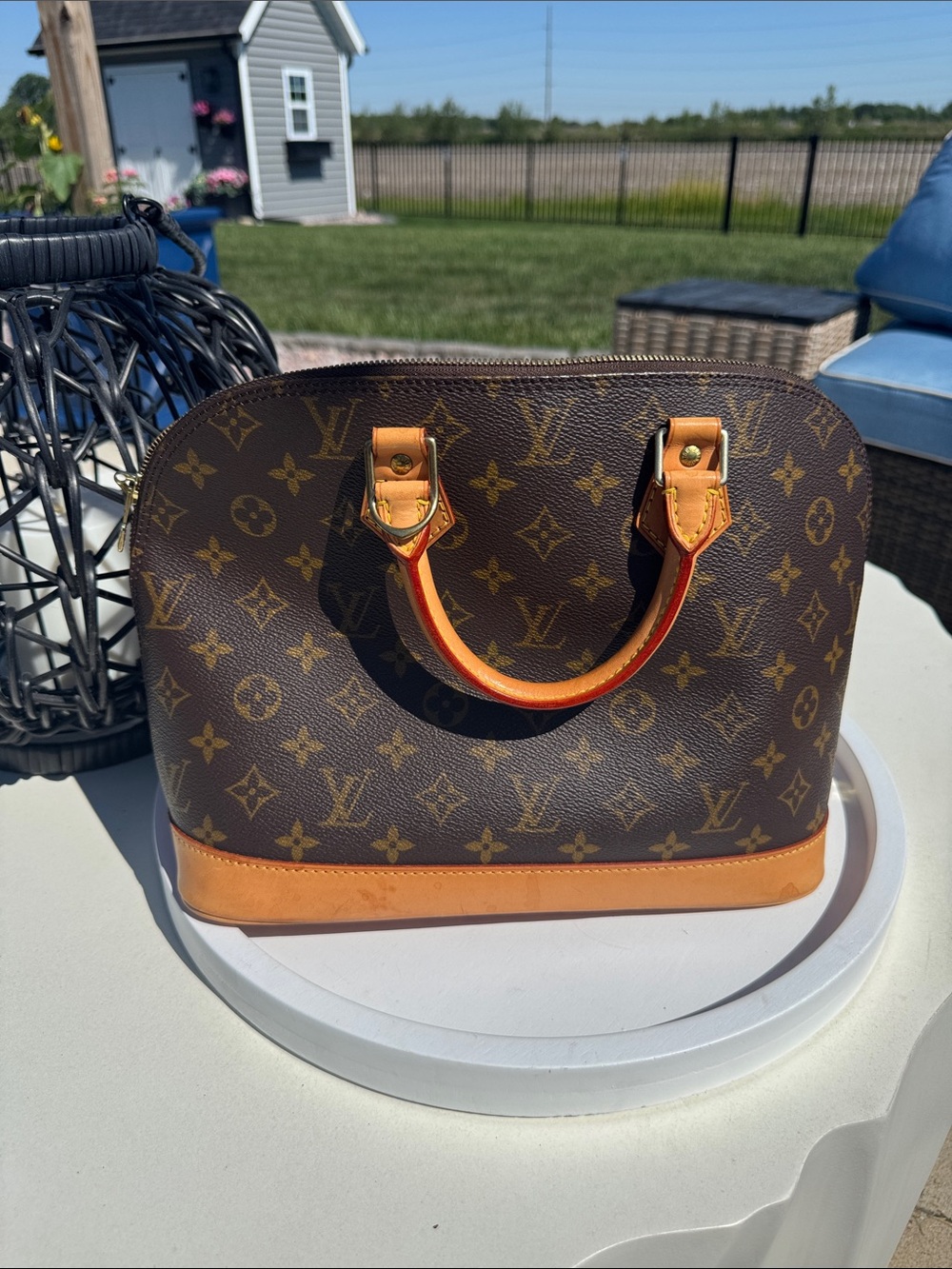 Louis Vuitton Monogram Alma Satchel in Brown with Vachetta Trim